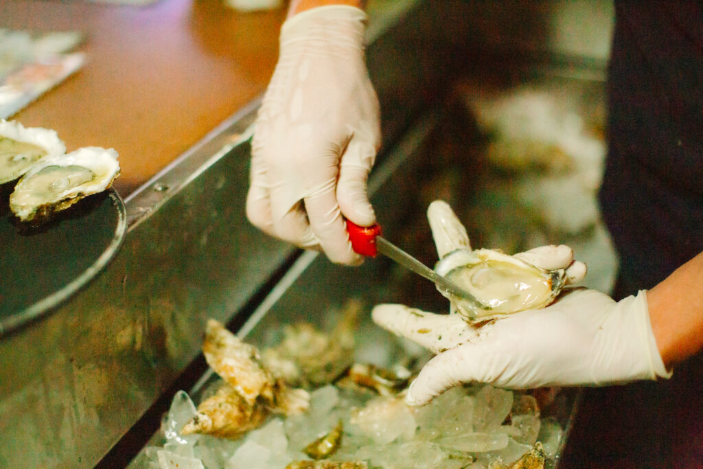 How To Shuck An Oyster 5 Tips To Shucking Oysters Like A Pro — Destination Panama City