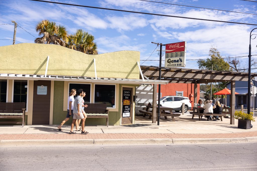 Panama City Genes Oyster Bar 3 people walking to Genes Oyster Bar 2024 Orange Video 1