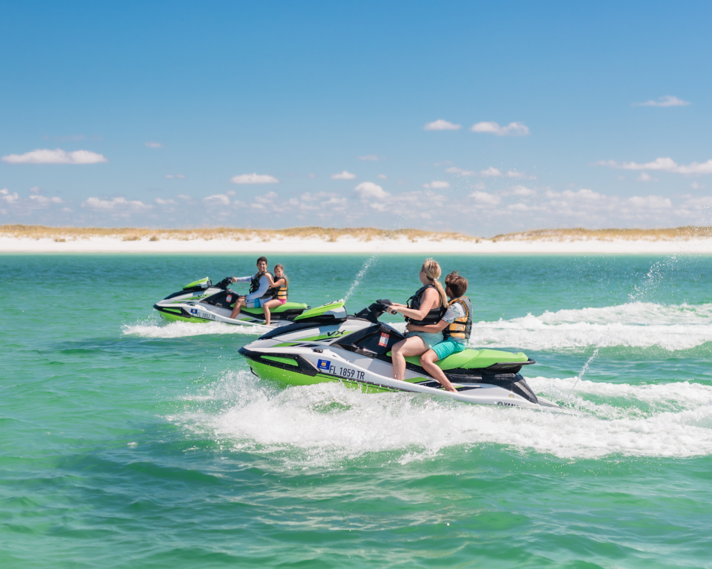 Outdoor & Water Activities in Panama City, Florida 2 Families cruise the emerald waters on jet skis, one of the thrilling water activities in Panama City, Florida.