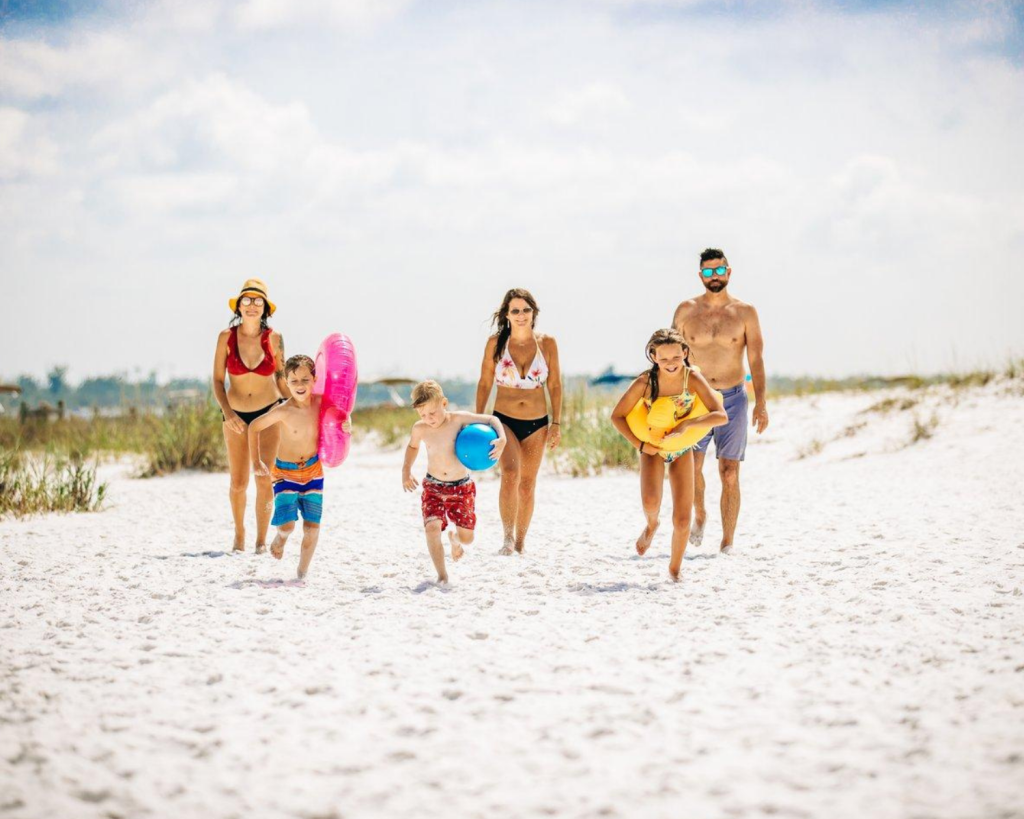 Outdoor & Water Activities in Panama City, Florida 8 A family strolls down Shell Island ready to enjoy water activities in Panama City, Florida