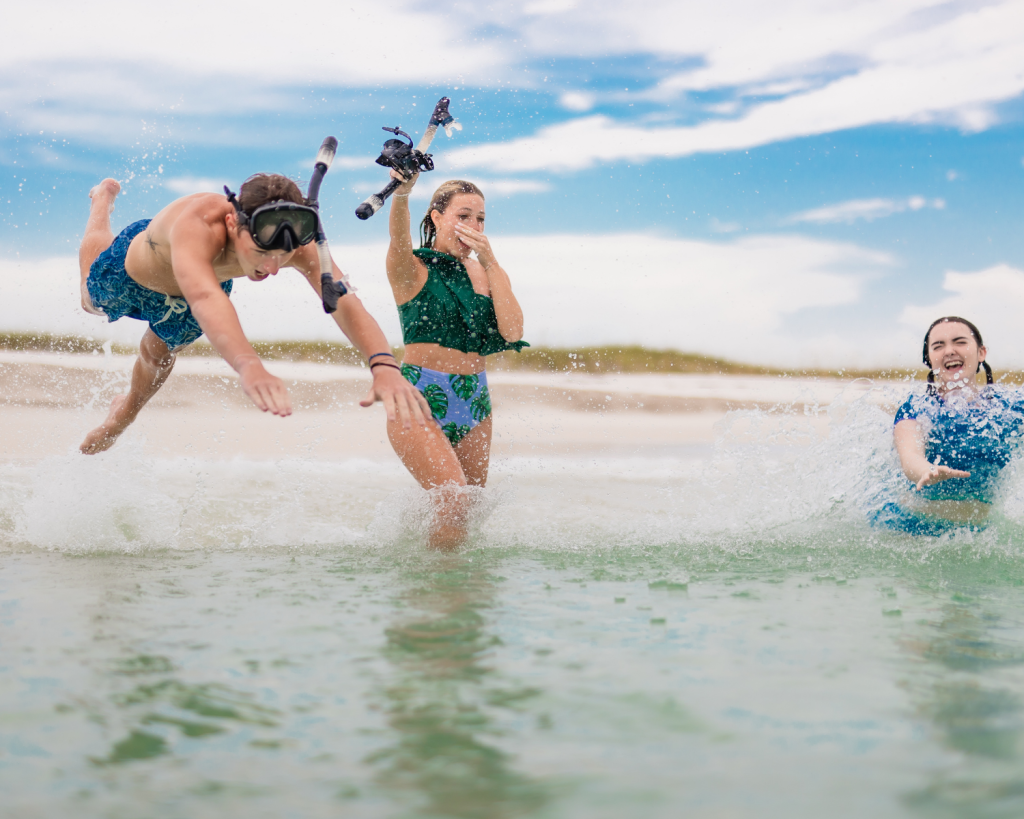 Outdoor & Water Activities in Panama City, Florida 4 A group of friends dives into fun with snorkeling and playful splashes—signature water activities in Panama City, Florida.