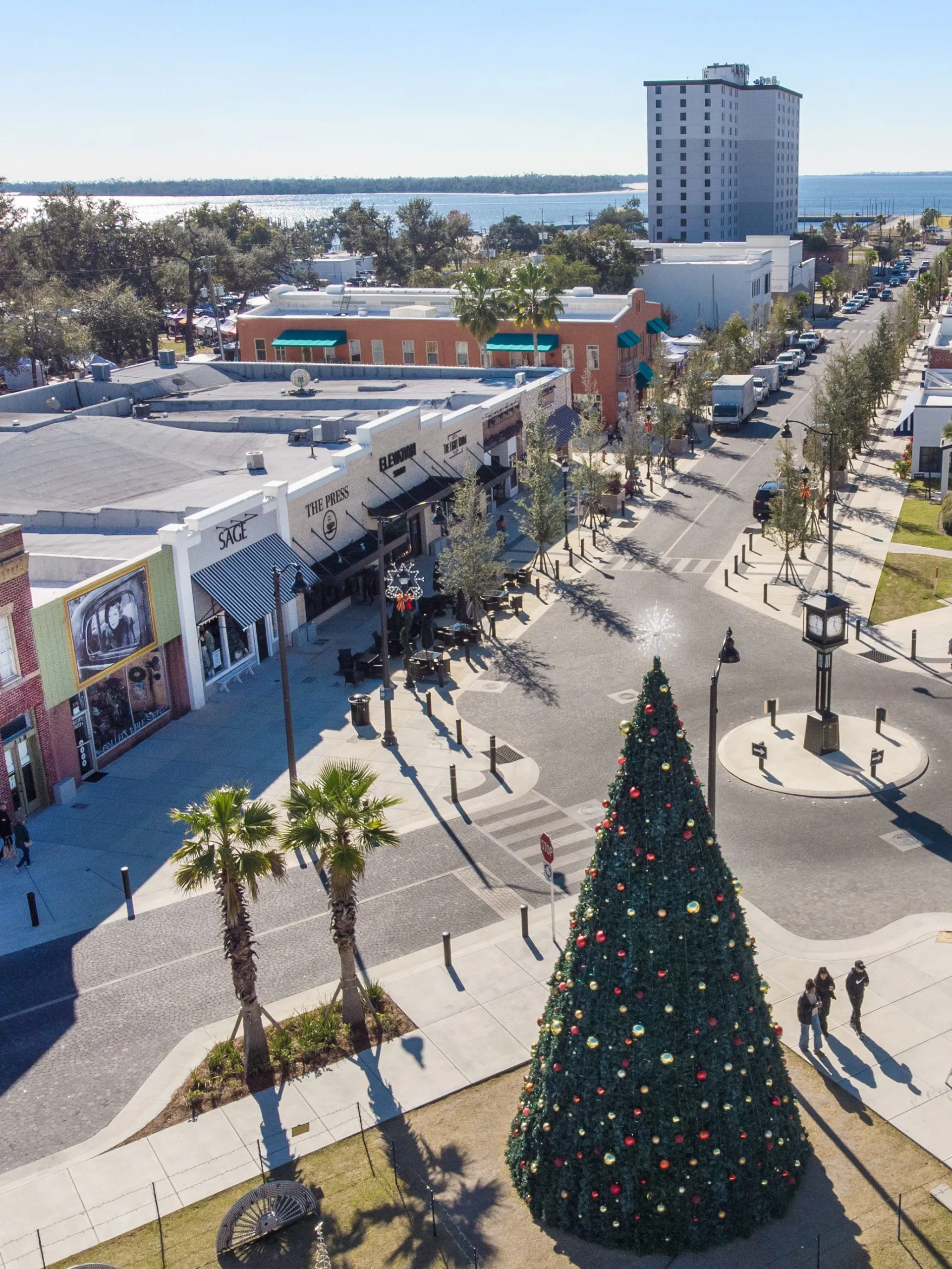 Aerial view of Downtown Panama City during winter in Panama City, featuring the Christmas tree lit up at the Center for the Arts along the waterfront
