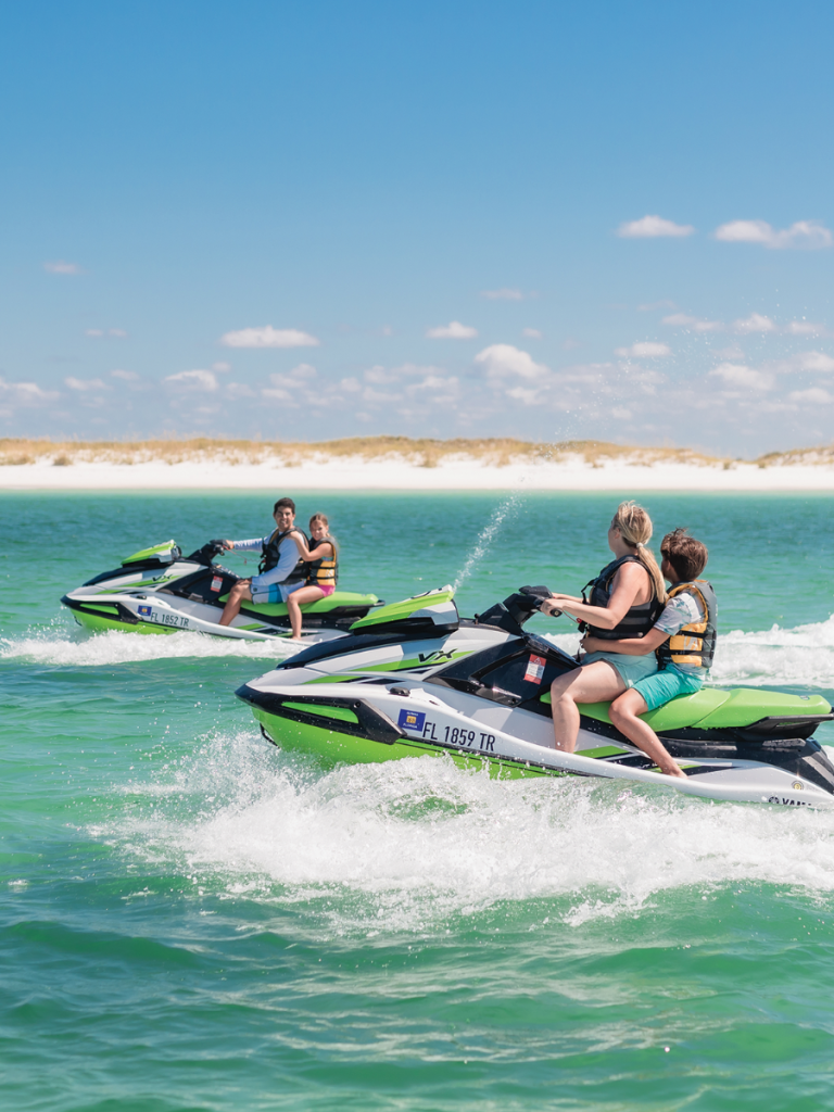 Top 10 Activities for a Family-Friendly Spring Break in Panama City, Florida 11 Family riding jet skis across the turquoise water during a family-friendly spring break in Panama City.