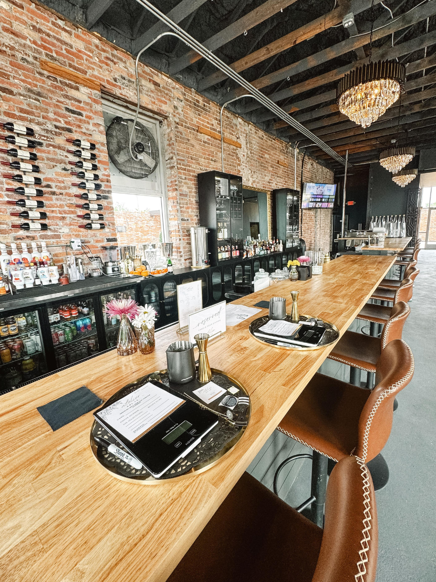 Inside Atelier candle bar and lounge in Panama City FL, where candle making meets craft cocktails for a standout skillcation experience in Florida