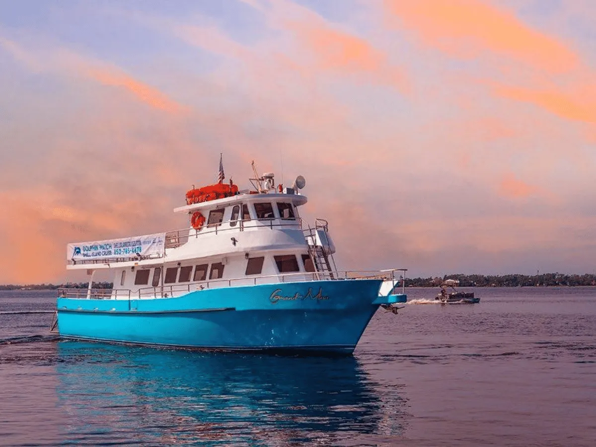 Grand-Mére sunset cruise sailing across St. Andrews Bay during sunset in Panama City Florida.